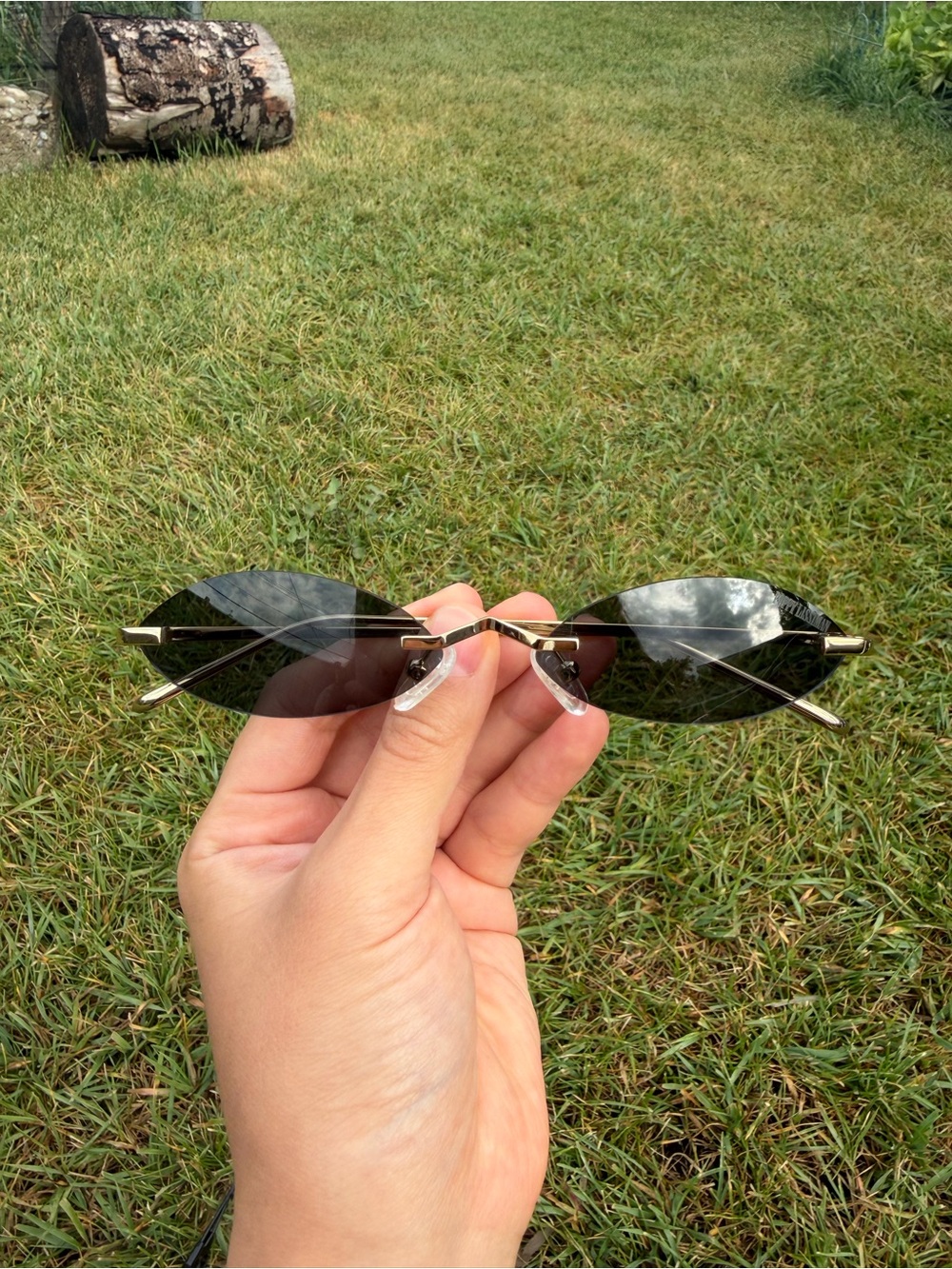 Rimless Oval Black Sunglasses for Women
